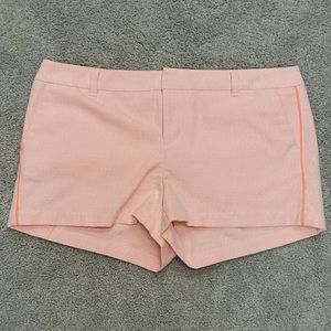 Neon orange shorts with orange piping
